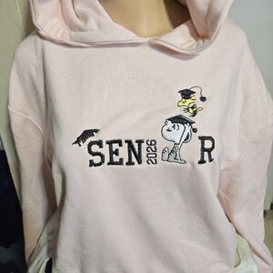 women Snoopy senior sweaterPlease note that the sweater has a minor defect; kind